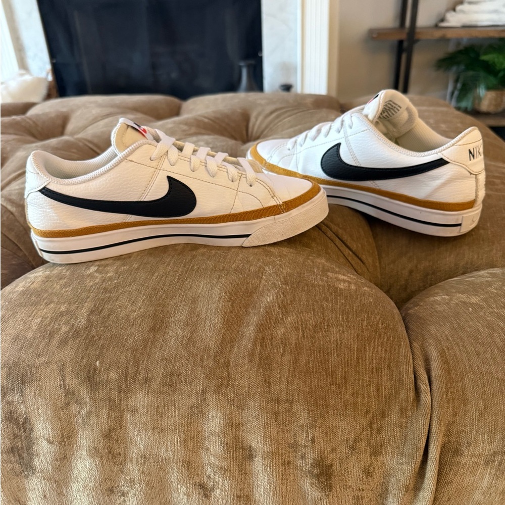 Nike women’s White & Gold Low-Top Sneakers with Black Swoosh